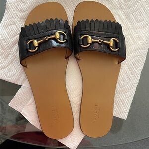 Gucci  Leather Fringe Horsebit Slide Sandals with Tan Footbed.